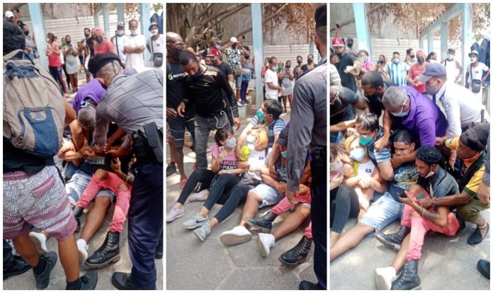 Cubanos protagonizan protesta contra el Gobierno coreando 'Patria y Vida' en el céntrico boulevard de Obispo, en La Habana